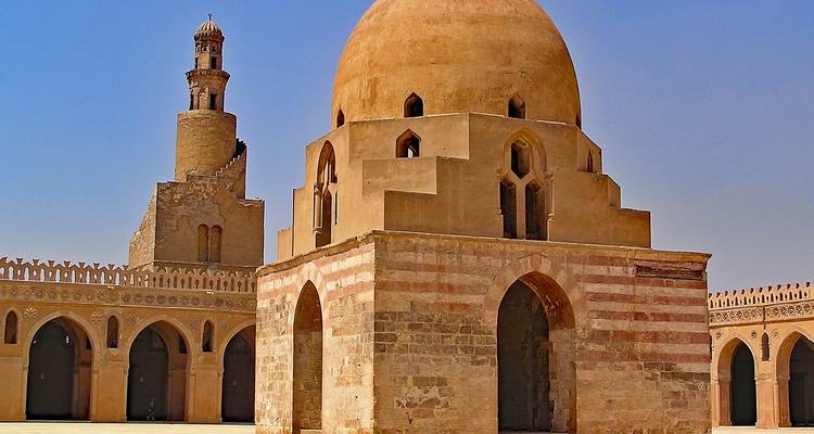 A historical mosque with a large dome and minaret.