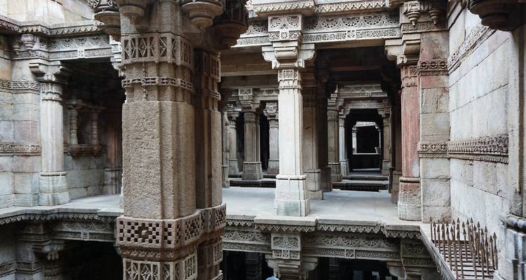 Intricate stone architecture inside a historical stepwell.