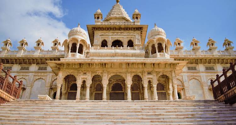 A grand marble structure with steps leading up.