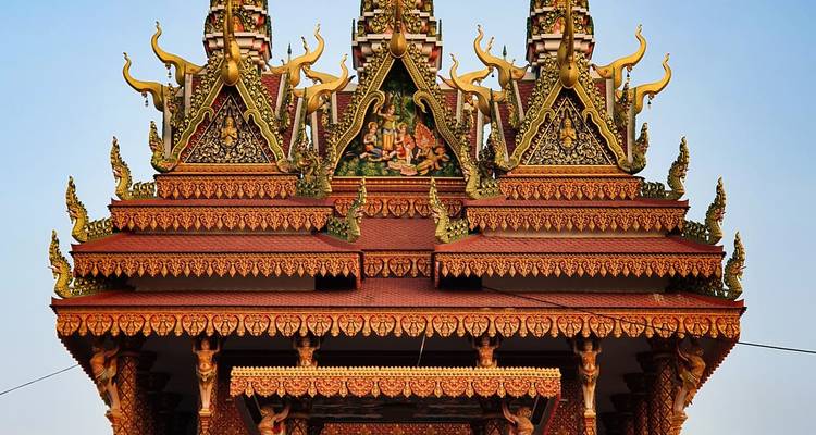 Ornate temple roof with intricate decorations.