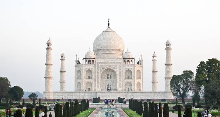 Taj Mahal in Agra with gardens in the foreground.