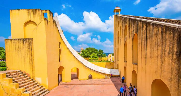 Jantar Mantar astronomical instruments with people around.