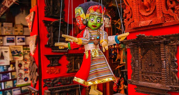 A puppet with intricate design in a shop