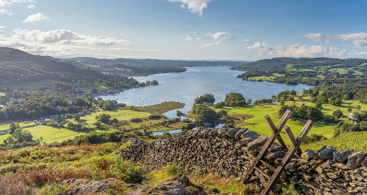 Lake District with a view of a lake and surrounding hills.