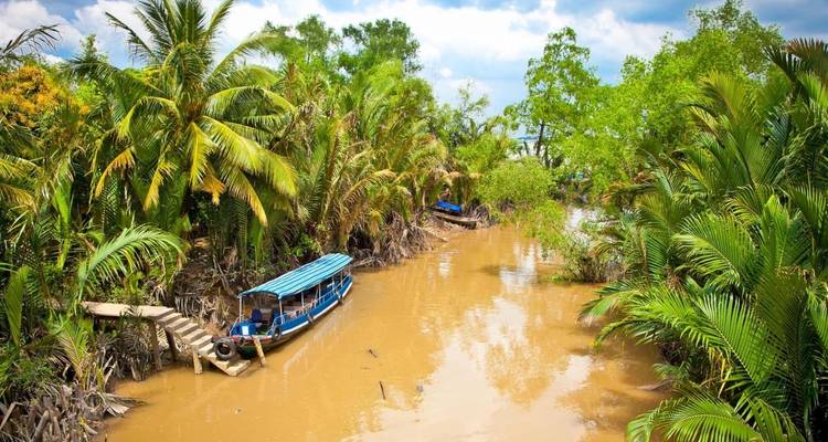 Saigon Group Tour to Ben Tre, Can Tho, Vinh Long with Floating Market in Mekong Delta - DNQ Travel 7