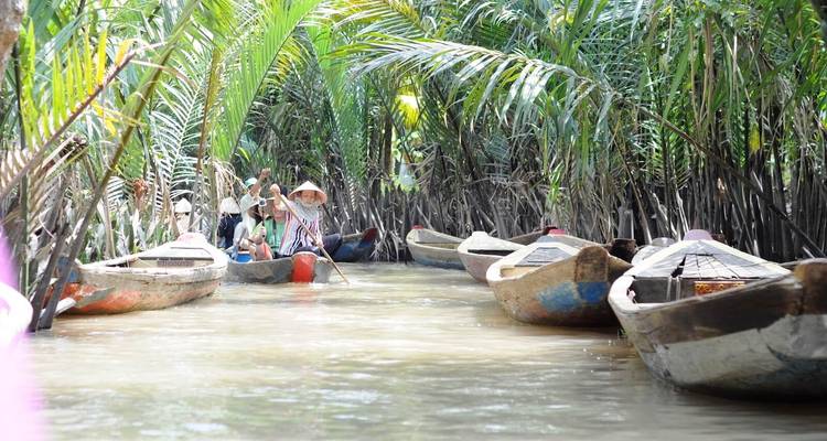 Saigon Group Tour to Ben Tre, Can Tho, Vinh Long with Floating Market in Mekong Delta - DNQ Travel 9