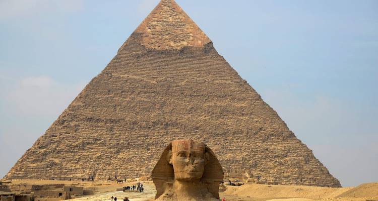 The Sphinx in front of the Pyramid of Giza.
