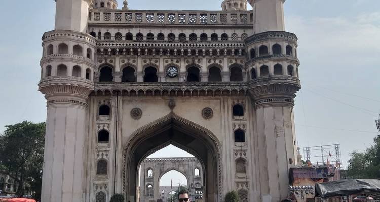 Charminar with a person in front.