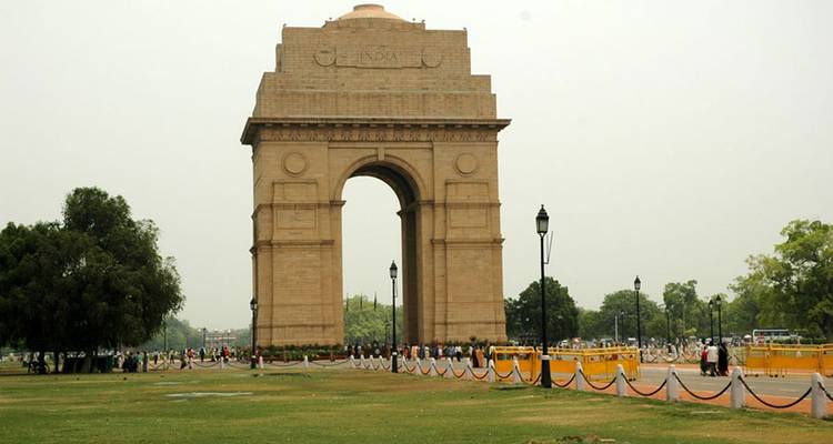 Famous city landmark with crowd and surrounding park