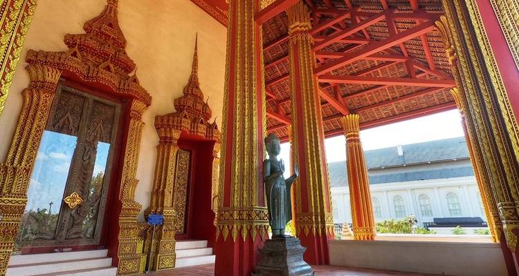 Temple entrance with intricate red and gold decorations.