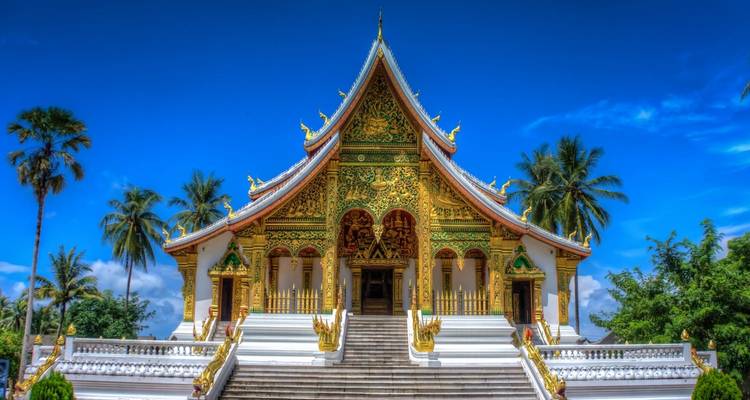An ornate temple with grand steps and detailed decorations.