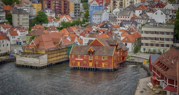 View of buildings near a waterfront with red roofs.