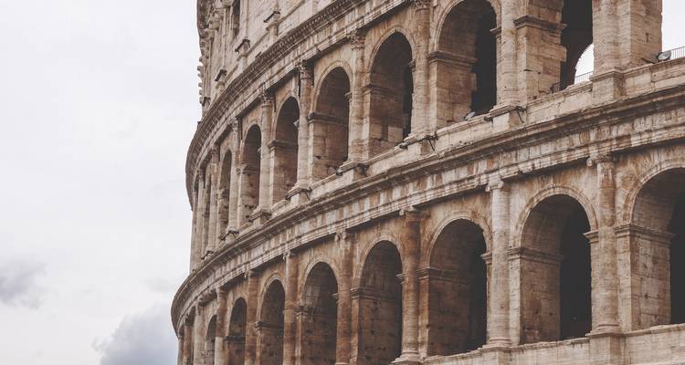 Close-up view of the Colosseum in Rome showcasing its arches.
