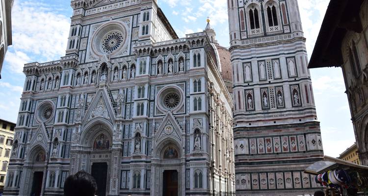 Facade of Florence Cathedral with detailed architecture.