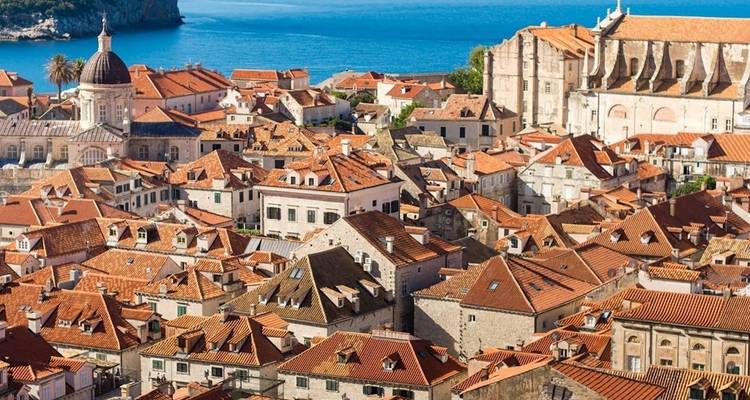 Overlooking the red-tiled rooftops of Dubrovnik towards the sea.
