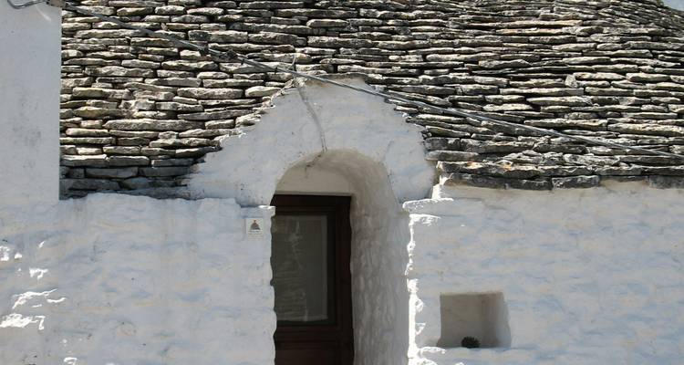 Close-up van een trullo-huis gemaakt van steen.