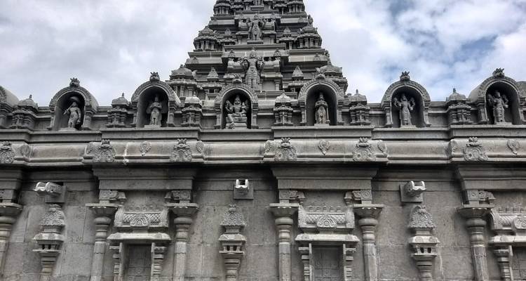Detailed view of an ancient temple with carvings.