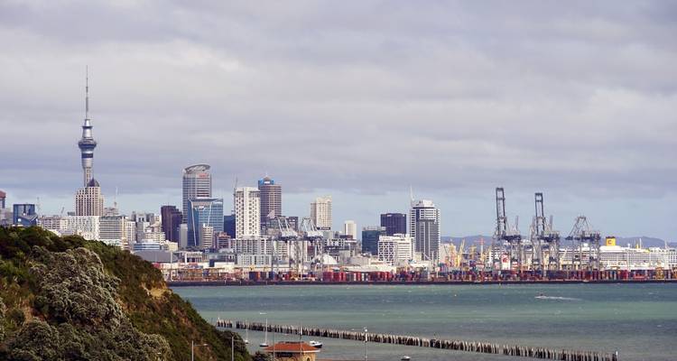 Auckland city skyline with prominent Sky Tower.