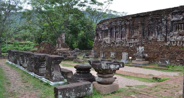 Ancient ruins surrounded by greenery.
