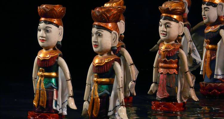 Water puppetry figures in water.