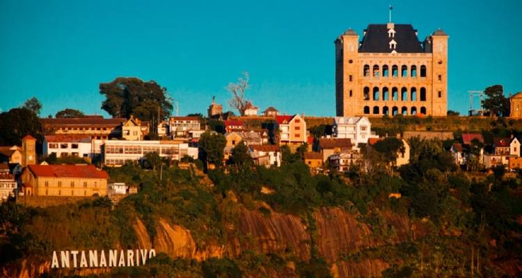 View of a prominent historic building on a hillside.