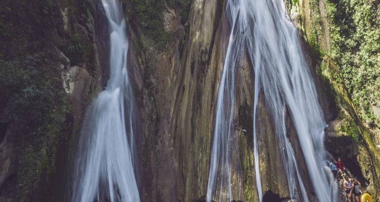 A majestic waterfall cascading down rocks.