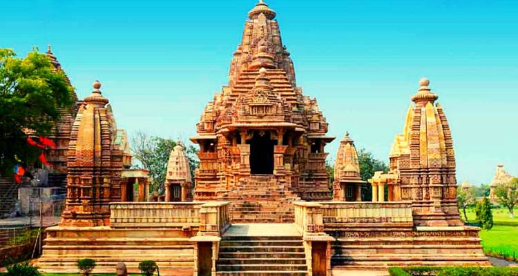 Temple with intricate architecture against a blue sky.