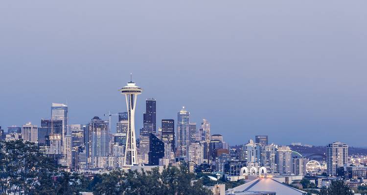 Seattle skyline featuring the Space Needle and city buildings.