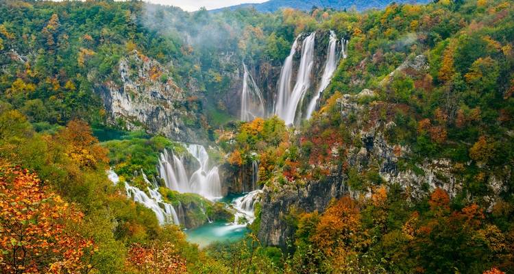 Beautiful waterfalls within a lush forest in Plitvice Lakes National Park, Croatia.