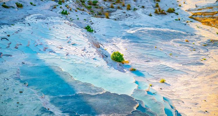 Natural calcium terraces with turquoise water.