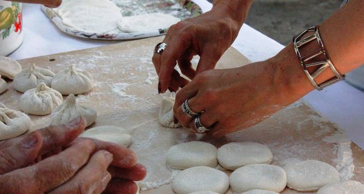 Hands making traditional dough.