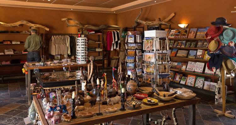 Interior of a souvenir shop with various goods on display.