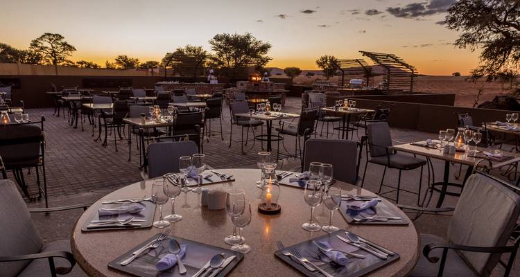 Outdoor dining setup at sunset.
