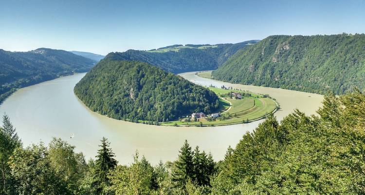 River bend with lush green hills.