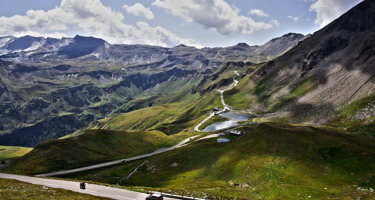 Panoramic view of mountain landscape with winding road