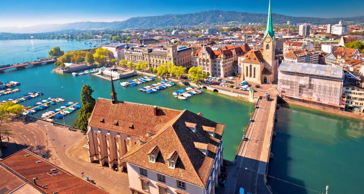 A panoramic view of Zurich with its classical architecture and water.