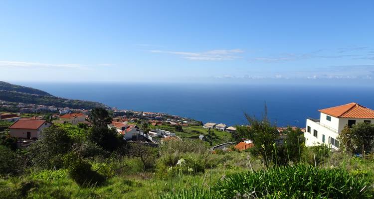 Hillside village with ocean view.