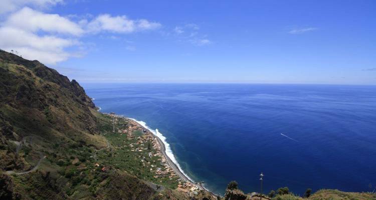 Expansive view of the coast with blue ocean.