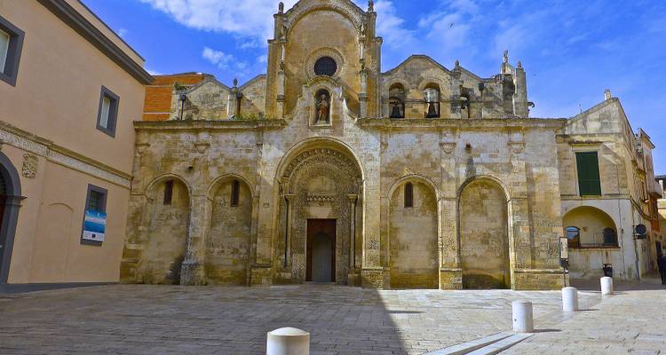 Facade of an old church with a clear sky.