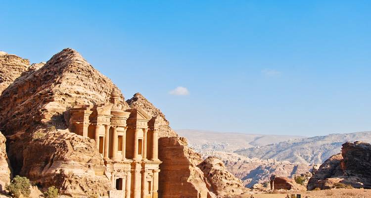 The Monastery at Petra with a blue sky backdrop.