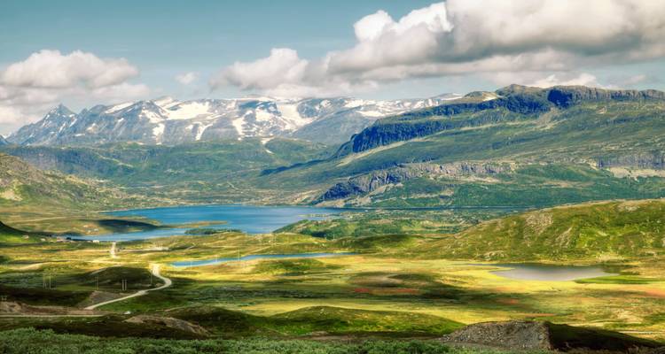 Panoramic view over mountains and a fjord in Norway.