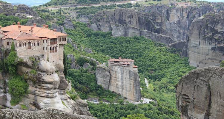 Dramatic rock formations with monasteries built atop.