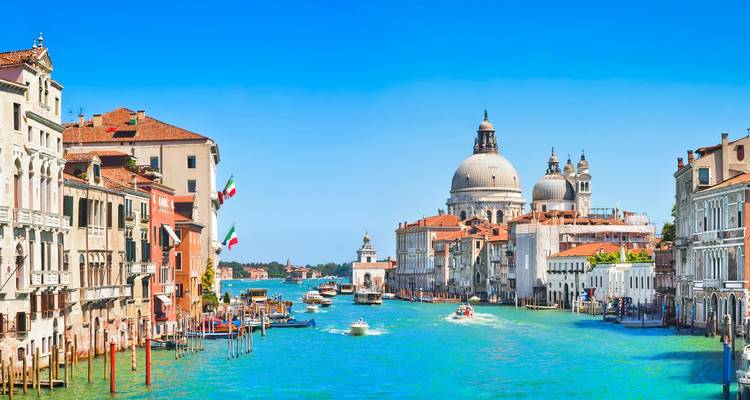 Picturesque view of Venice with canals and historic buildings.