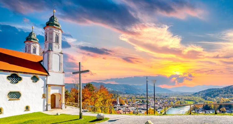 Church on a hill with a dramatic sunset sky.