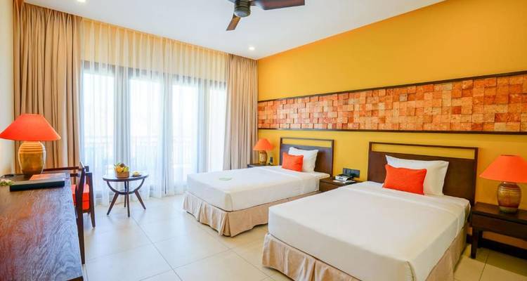 Colorful hotel room with modern decor.