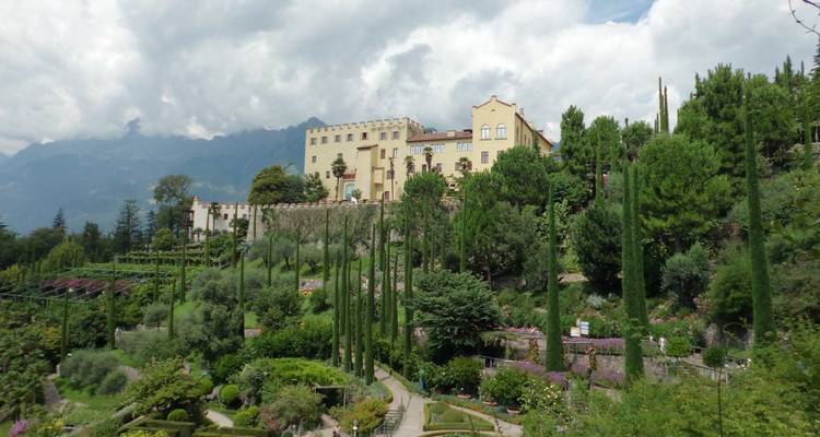 Historic building surrounded by gardens in Merano.