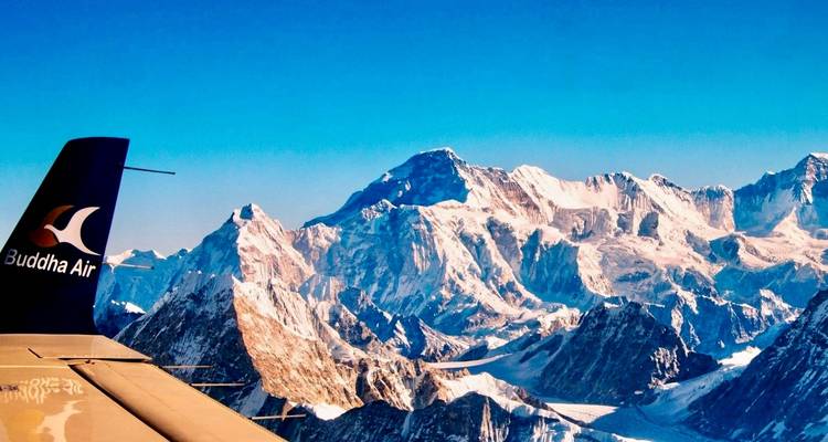 Aerial view of the Himalayas from an airplane window.