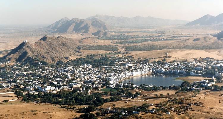 Panoramic view of Pushkar city with surrounding landscapes.