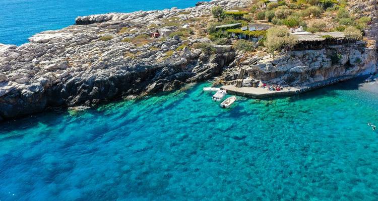 Rocky coastline with clear blue water.