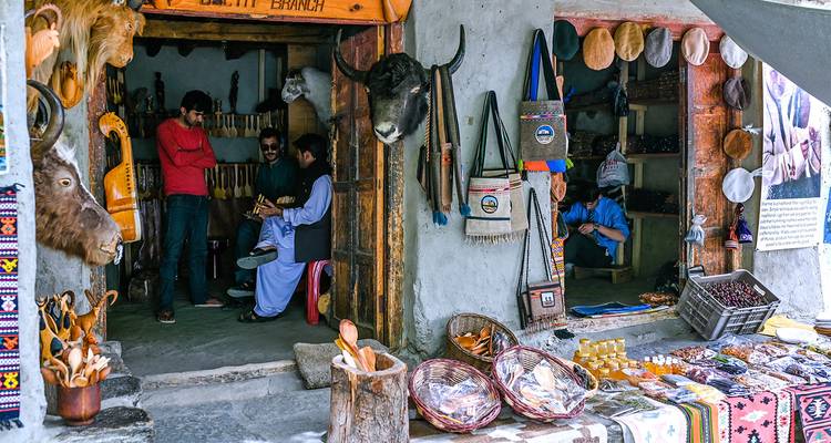 A traditional market shop with various local products on display.